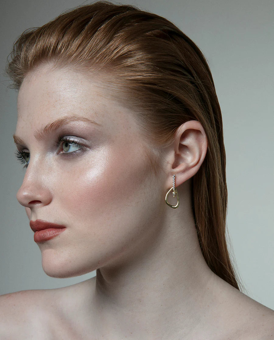 Pendientes de plata de primera ley con baño de oro y fila de circonitas y colgante