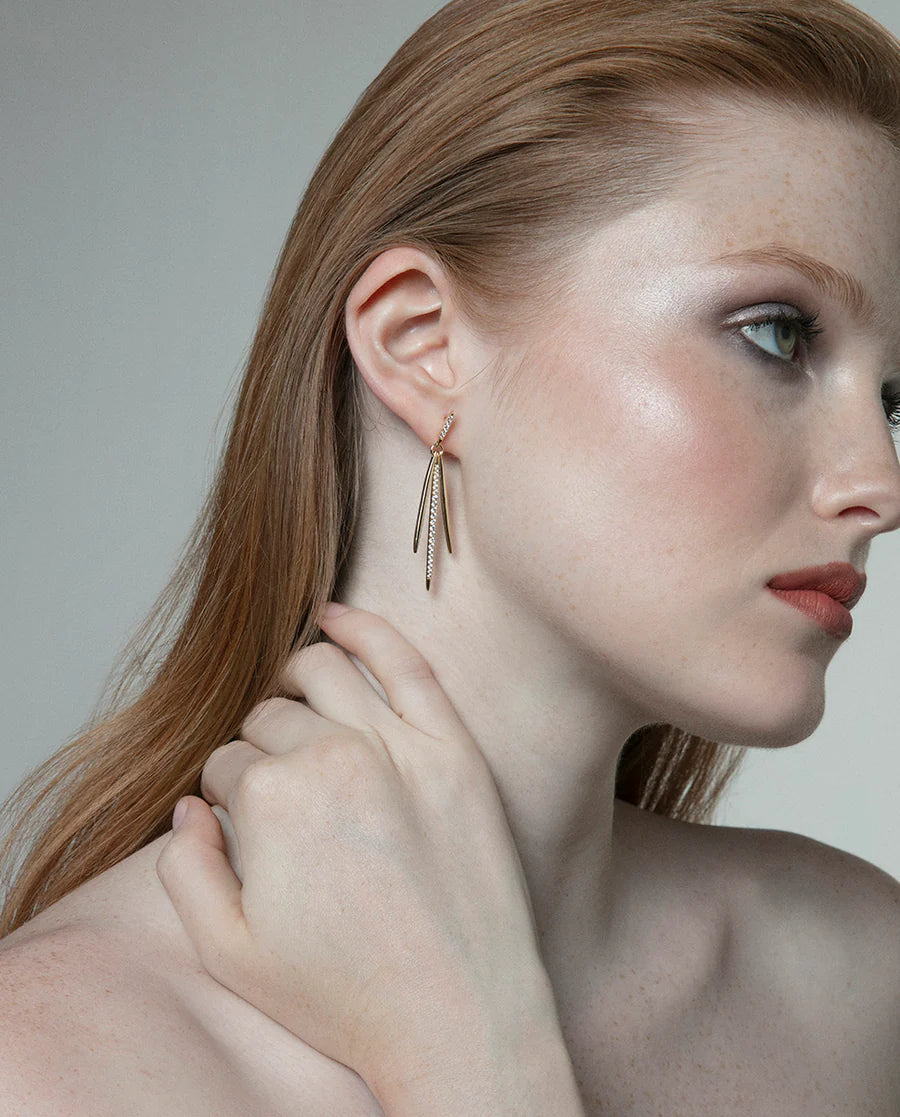 Pendientes de plata de primera ley con baño de oro con tres colgantes